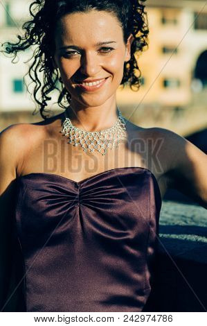 Young Cute Brunette Portrait Posing At Sunset