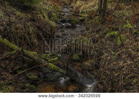 Upper Watercourse Of Bilina River In Krusne Hory Mountains In Winter Day