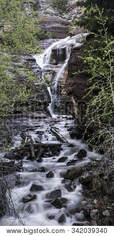 Cascading Waterfall In The Colorado Rocky Mountains.