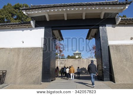 Osaka, Japan- 01 Dec, 2019: The Ornate Black And White Otemon Entrance Gate Of Osaka Castle.