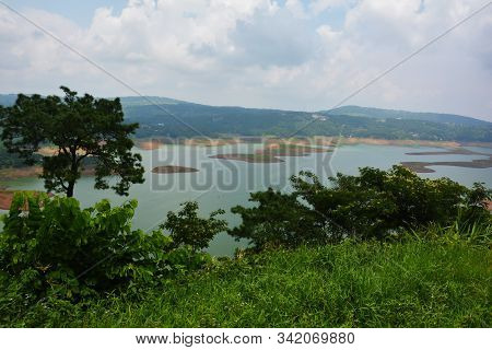 Barapani Or Umiam Lake Of  Shillong, Meghalaya As Seen Fron The View Point On The Road With Water, T