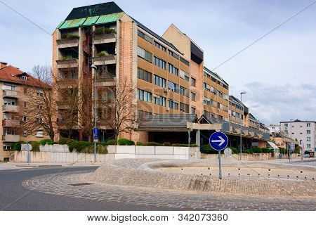 Cityscape With Road And Roundabout And House Building Celje Slovenia