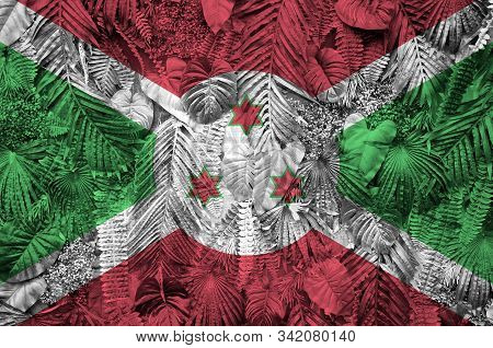 Burundi Flag Depicted On Many Leafs Of Monstera Palm Trees. Trendy Fashionable Backdrop