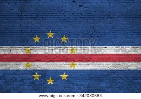 Cabo Verde Flag Depicted In Paint Colors On Old Brick Wall. Textured Banner On Big Brick Wall Masonr