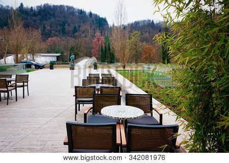 Cityscape With Street Cafe In Park In Celje