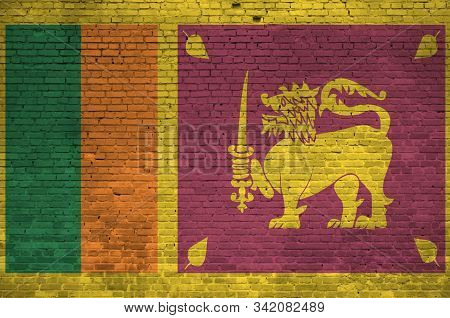 Sri Lanka Flag Depicted In Paint Colors On Old Brick Wall. Textured Banner On Big Brick Wall Masonry