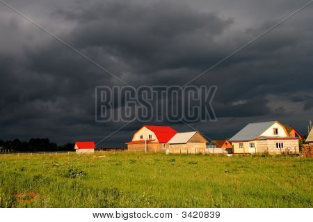 Huse og skyer