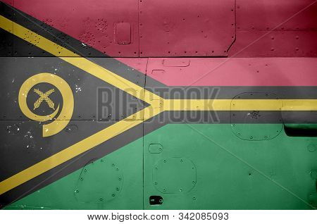 Vanuatu Flag Depicted On Side Part Of Military Armored Helicopter Closeup. Army Forces Aircraft Conc