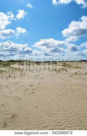 Romo Peninsula - Fantastic Beach In Denmark With Colorful Wind Chimes. Cloudy Summer Day