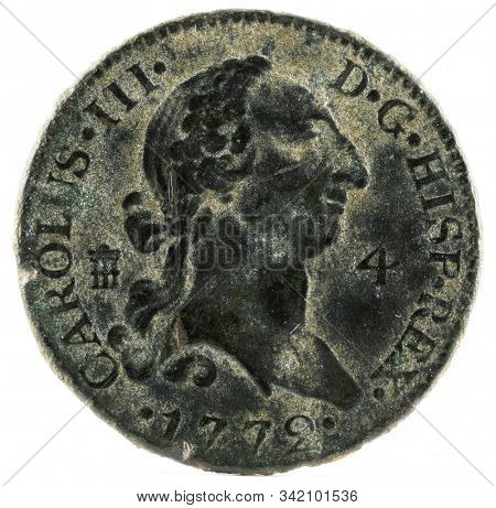 Ancient Spanish Copper Coin Of The King Carlos Iii. 1772. Coined In Segovia. 4 Maravedis. Obverse.