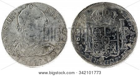 Ancient Spanish Silver Coin Of The King Carlos Iii. 1779. Coined In Mexico. 8 Reales.