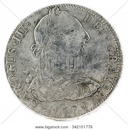Ancient Spanish Silver Coin Of The King Carlos Iii. 1779. Coined In Mexico. 8 Reales. Obverse.