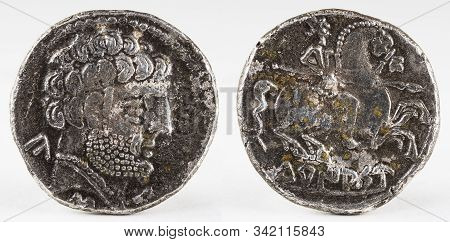 Ancient Turiaso Iberian Spain Silver Denarius. Obv. Bearded Male Head Right.
Rev. Rider Right, Holdi