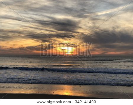 Bright Sunset On The Beach Of Costa Da Caparica, Portugal