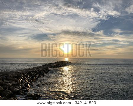 Bright Sunset On The Beach Of Costa Da Caparica, Portugal