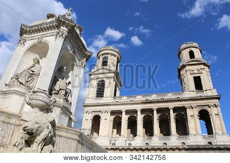 The Fountain And The Church Of Saint-sulpice In The City Of Paris