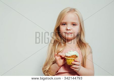 Beautiful Little Girl Blonde With Cake And Candy Portrait Of Food