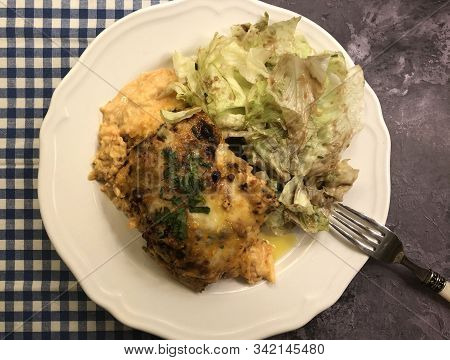 Lasagna Al Forno With Sauce Bolognese And Salad.