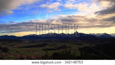 Panorama On Evening From The Alps By Sunset