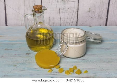 Facial Cream Of Homemade Olive Oil In Glass Jar, With Pieces Of Virgin Beeswax. Medicine And Alterna