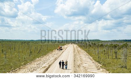 Road Consruction Through The Swamp Olmany. Ecological Problem. Aerial View.