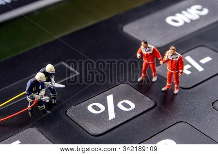 Closeup Of Miniature Figurines Dressed Like Members Of Firemen Special Team Interfering During Gas A