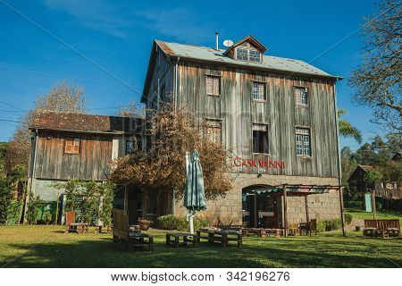 Bento Goncalves, Brazil - July 11, 2019. Charming Old Rural House Made Of Wood And Stone From The Re