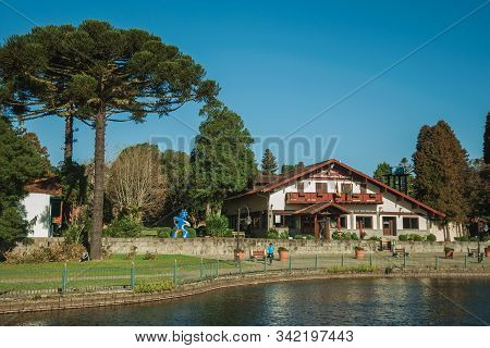 Gramado, Brazil - July 21, 2019. Wooded Park With The Joaquina Rita Bier Lake And House In German-in