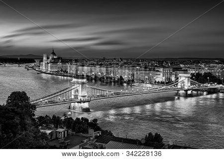 Budapest Hungary, Sunset Panorama Of Budapest, Hungary, With The Chain Bridge And The Parliament Bla