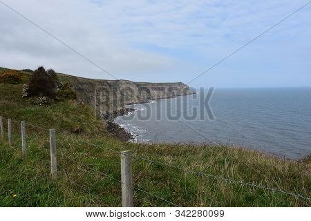 Beautiful Scenic Seascape With Sea Cliffs In North Yorkshire England.