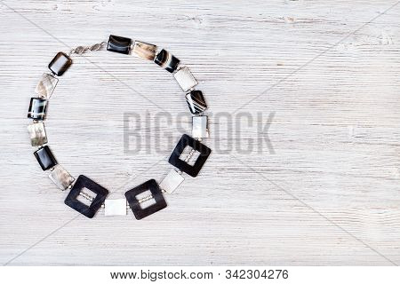 Needlecraft Background - Top View Of Hand Crafted Necklace From Horn Frames, Silver Balls, Square St