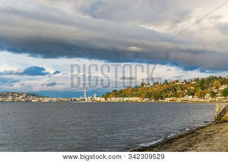 A View Of Condos At Alki Beach And The Seattle Skyline.