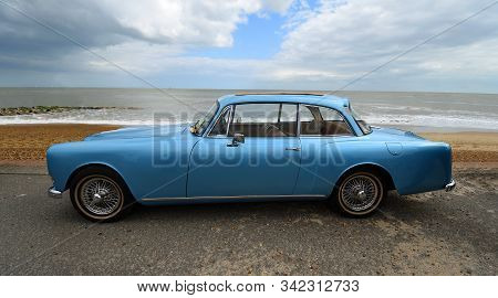 Felixstowe, Suffolk, England - May 05, 2019: Classic Blue Alvis Motor Car Parked On Seafront Promena
