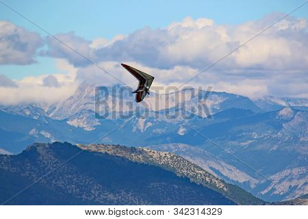 Hang Glider Flying From The Chabre Mountain, France