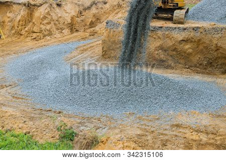 Foundation Of The House Moving Gravel Excavator In The Construction Works