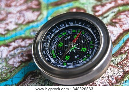 Map And Compass. True Navigation To Be Sure Of The Journey.
