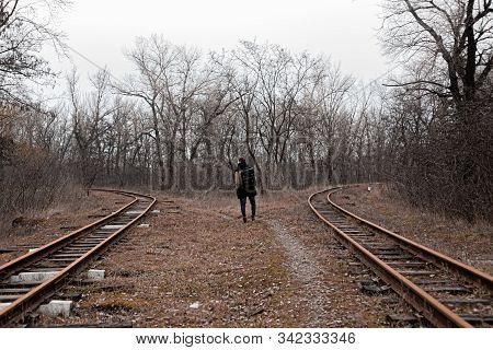 A Man On The Railway Steps On A Journey From Hustle And Bustle. Stock Photo.