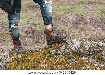 Guy Hiking In Comfortable Hiking Boots. Boots Close-up Stock Photo.