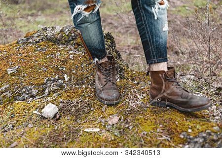 Guy Hiking In Comfortable Hiking Boots. Boots Close-up Stock Photo.