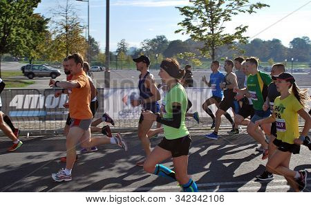 Warsaw, Poland - April 14, 2015: Orlen Warsaw Marathon. Group Of Athletes Running On A Street.
