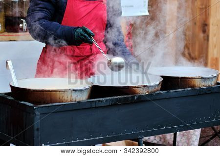 Christmas City Fair. Close Up View Of The Pot Filled With The Mulled Wine