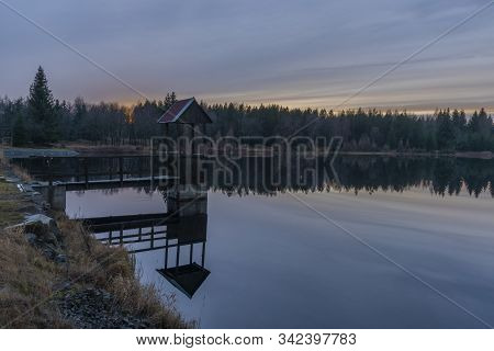 Ponds In Krusne Hory Mountains In Winter Cloudy Evening