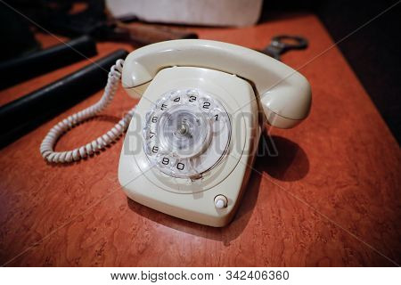 Details With A White Old Fashioned Dial Rotary Phone From The Communist Romania Era.