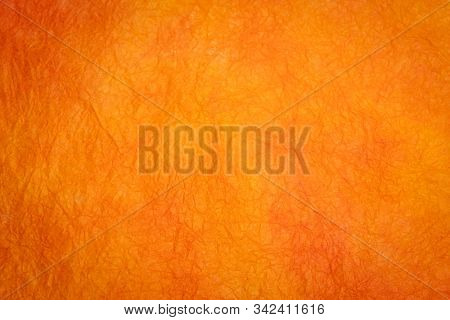 background of orange and red marbled momi paper