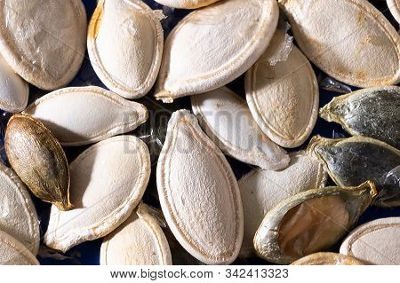 Vegan Food. Raw Pumpkin Seeds For Roasting Closeup.