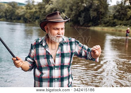 Senior Man Fishing. Fishing On The Lake. Fish On Hook. Master Baiter. Gone Fishing. Summer Vacation.