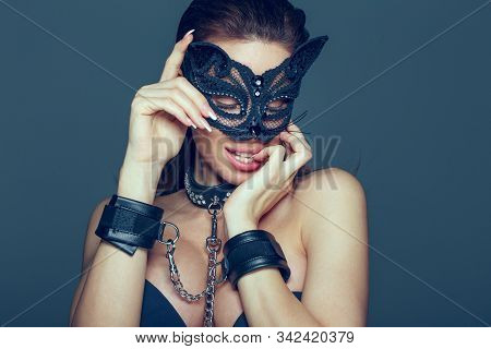 Sensaul Brunette Woman In Catwoman Mask And Leather Handcuffs, Desire Inside, Portrait