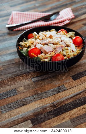 cereal specialties cooked with salad, roasted chicken aiguillette cured with salted and bacon