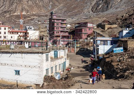 People On The Road In Muktinath
