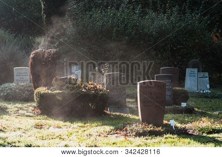 Hamburg, Germany - November 9, 2019: Grave Stone In Ohlsdorf Cemetery In The Morning In Hamburg City